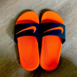 Nike size 2 summer flips. Worn twice and like new.